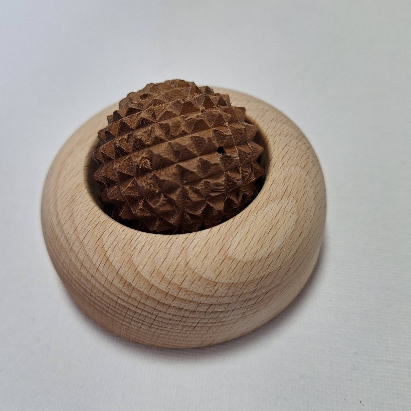 Palm massager with ball